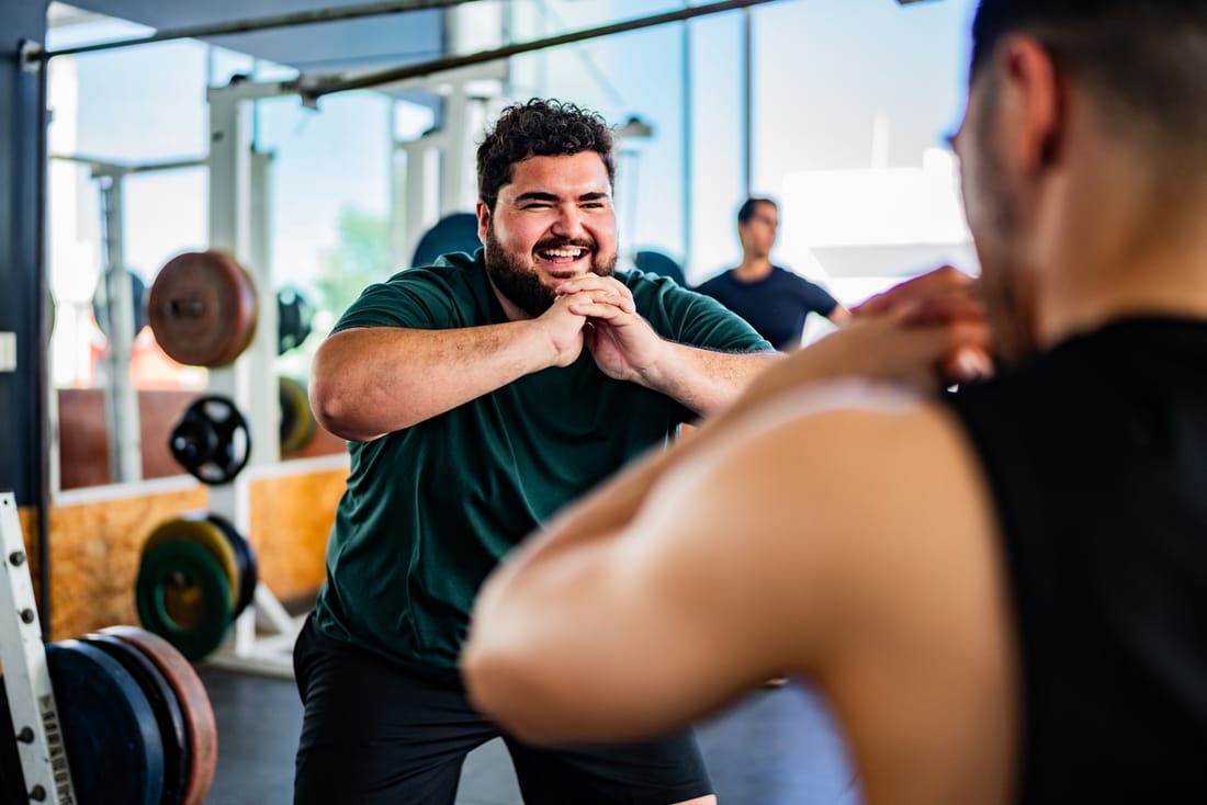 A person feeling energized during a workout at the gym